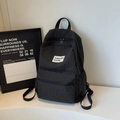 Minimalistischer schwarz-weißer Rucksack mit Karomuster und großem Fassungsvermögen - Schwarz