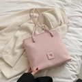 Pale pink pleated tote bag with stylish vertical accordion texture and slim leather handles - Pink