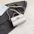 Minimalist white leather handbag with silver metallic clasp and adjustable strap - White