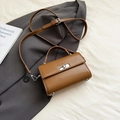 Vintage brown PU leather handbag with silver metallic buckle and adjustable strap - Brown