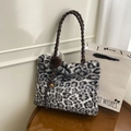 Faux fur leopard print tote bag with brown woven handles and luxury bell pendant - Black and White with Pendant