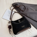 Chic black suede shoulder bag with brown leather base and plush fur ball charm - Black with Pendant