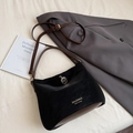 Minimalist black matte crossbody bag with brown leather straps and metal charm detail - Black without Pendant