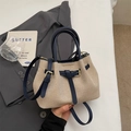 Elegant beige woven bucket bag with navy blue leather trim and adjustable strap - No Pendant / Blue