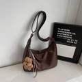 Dark brown crescent shoulder bag in grainy PU leather with cute plush bear keychain - Coffee (With Pendant)