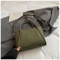 Detail view of military green bucket bag featuring soft matte leather and round handles - Standard Type / Green