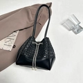 Fashionable black bucket bag with woven stitching and pearl drawstring details - Black