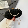 Elegant black oval pearl evening clutch with leopard velvet texture and gold chain strap - Black