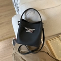 Retro black bucket bag in premium lychee leather with chic silver metal cross buckle - No Pendant / Black
