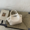 Chic cream white bucket handbag with glossy wrinkled texture and elegant silver hardware - White Without Pendant