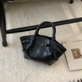 Chic black pleated faux leather bucket bag with silver lock and top handle finish - Brown No Pendant