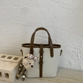 Minimalist cream white and brown leather bucket bag with cute bear charm and shoulder strap - White with Pendant