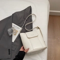 Minimalist cream white leather bucket bag with top handle and magnetic flap closure - White Without Pendant