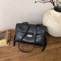 Detail of vintage black matte handbag with contrast white stitching and silver rotary lock - No Pendant / Black