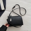 Elegant black lychee grain leather square crossbody bag with silver rotating metal buckle - Black