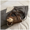 Dark brown retro bowling bag in glossy synthetic leather with plush charm and bead chain - With Charm Style / Brown with Pendant