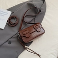 Minimalist vintage dark brown saddle bag in glossy leather with unique woven charm detail - Shoulder Crossbody (With Pendant) / Brown with Pendant