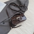 Deep brown patent leather crossbody bag with silver buckle and round top handle - Coffee with Pendant