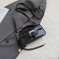 Glossy black rectangular handbag with silver heart pendant and adjustable strap for women - Black with Pendant