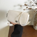White lychee leather shoulder bag with silver turn-lock and detachable strap - White