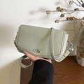 Elegant sage green lychee grain leather underarm bag with silver turn-lock closure - Green