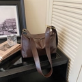 Chic dark brown faux leather tote bag with glossy finish and wide adjustable strap - Brown
