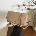 Minimalist light coffee leather shoulder bag with lychee texture and silver twist lock - Khaki