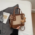 Borsa a secchiello in tela beige e pelle marrone con ciondolo a omino di pan di zenzero - Bianco Crema con Pendente