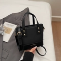 Sac seau noir minimaliste avec rivets dorés et mélange de cuir et de textile - Noir sans Pendentif