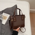 Sac seau marron foncé en cuir et tissu avec logo doré et bandoulière réglable - Café sans pendentif