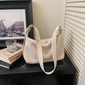 Detail of a creamy beige suede crossbody bag featuring gold metal buckle and leather strap - Off-white