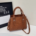 Brown faux leather tote bag with vertical stitching and adjustable shoulder strap - Yellow Brown