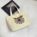 Cream white canvas tote bag with brown daisy embroidery and retro shoulder strap - Off White