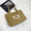 Khaki canvas tote bag with embroidered daisy flower and Maodo lettering detail - Brown