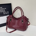 Large burgundy faux leather tote bag with dual handles and adjustable strap for women - Burgundy