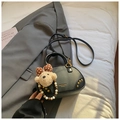 Black bowling bag in litchi grain faux leather with a cute polka dot bear pendant - Black with Pendant