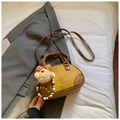 Retro mustard yellow textured crossbody bag with brown trim and bear charm decoration - Yellowish Brown With Pendant