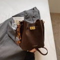 Retro dark coffee leather bucket bag with gold clasp and artistic wooden bead charm - Coffee with Pendant