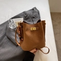 Retro brown suede bucket bag with gold clasp and tassel bead pendant for women - Brown with Pendant