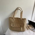 Minimalist khaki nylon tote bag with front snap pocket and wide shoulder straps - Khaki