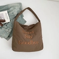 Bolso tote acolchado marrón grande con bordado naranja de Never Say Goodbye - Marrón