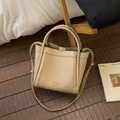 Elegant beige bucket bag with lychee leather texture and adjustable strap for women - No Pendant / Khaki
