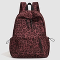 Modischer dunkelroter Rucksack mit Leopardenmuster, Stickerei und Kordelzug-Seitentaschen - Roter Leopard