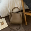 Caramel brown pebbled leather bucket bag with top handles and adjustable shoulder strap - No Pendant / Brown