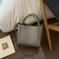 Minimalist grey litchi grain leather bucket bag with top handles and adjustable strap - No Pendant / Gray
