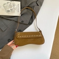 Vintage brown underarm bag with silver rivet trim and unique wavy bottom design - Brown