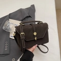 Vintage dark brown crossbody bag in matte faux leather with elegant contrast stitching - Brown