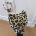 Leopard print plush handbag featuring a soft faux fur texture and a pink magnetic buckle - Leopard Print No Charm
