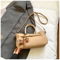 Elegant beige leather handbag with MIQUIER logo and brown horse charm detail - With Charm / Brown
