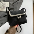 Chic black matte mini square crossbody bag with vintage kiss lock closure and silver chain - Black